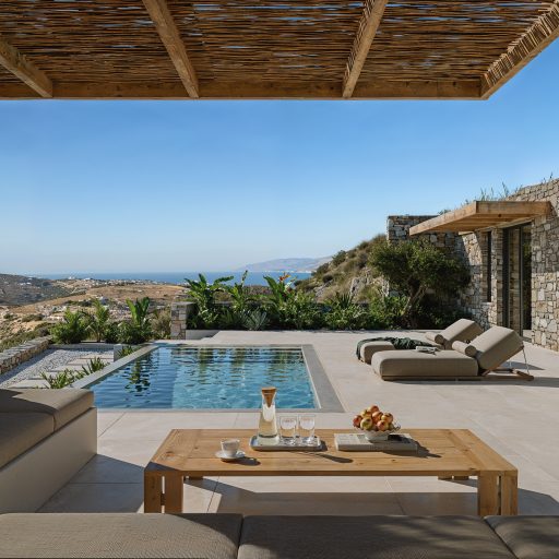 Private pool and unique outside lounge at Villa THEORS in Paros Greece overlooking the Lefkes-Kostos valley and the Aegean Sea.